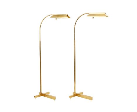 Casella Lighting, California, USA. Pair of mid-century modern brass floor lamps. With a cross-shaped base and a curved stem. 