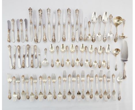 International, United States. 74-piece sterling silver flatware set in the pattern "Masterpiece," including: 12 dinner knives