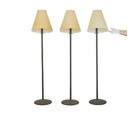 Leucos Lighting, Italy. Group of three floor lamps with conical glass shades and metal bases.Founded by Eugenio Pamio in Scor