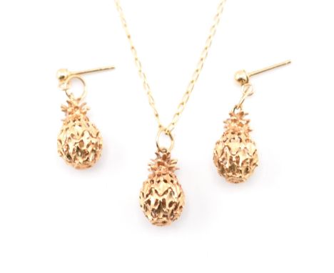 A 14ct gold pineapple pendant necklace and earring suite. The lot to include a 14ct gold pierced pineapple pendant strung on 