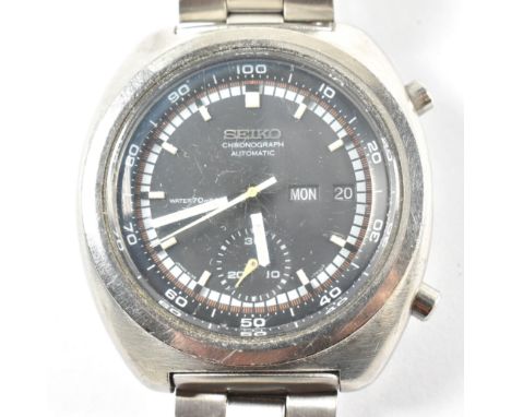 A vintage gentleman's stainless steel Seiko chronograph automatic wristwatch. The black dial with day, date and chronograph f