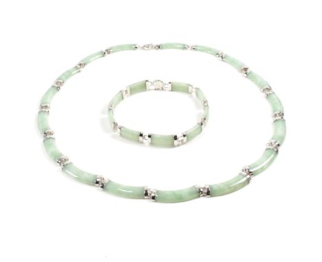 A 14ct white gold and jade bracelet and necklace suite. The jewellery formed with jade bars interspaced with white gold links