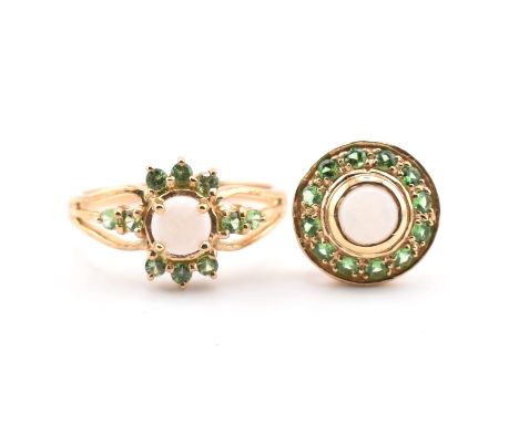 A hallmarked 9ct gold, white opal and tsavorite garnet ring together with a matching 9ct gold white opal and tsavorite garnet
