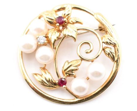 An 18ct gold, cultured pearl, diamond and ruby set brooch pin. The 18ct yellow gold round brooch pin having a pierced flower 