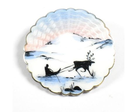 A Norwegian silver enamel winter scene brooch pin. The brooch pin with guilloche enamel decoration of a reindeer pulling a sl