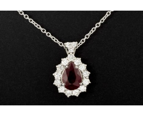 pear-shaped pendant in white gold (18 carat) with a ca 2 carat Burmese ruby surrounded by ca 0,60 carat of very high quality 
