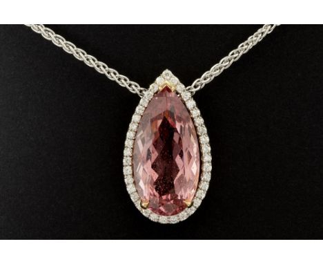 exceptional non-heated 17,35 carat "Imperial Topaz" with a beautiful pink color set in a pear-shaped pendant in white gold (1