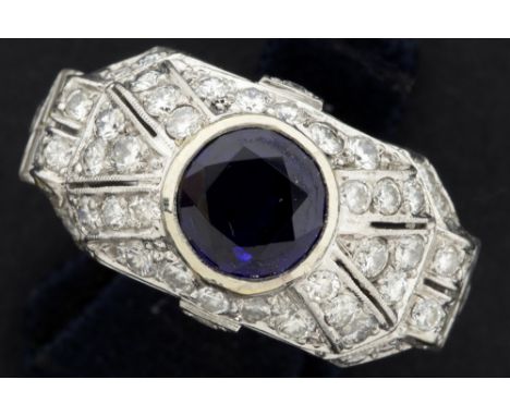 Art Deco ring in platinum with a ca 1,40 carat non-heated sapphire and ca 1,20 carat of high quality brilliant and baguette c