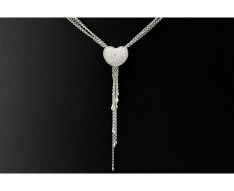 pendant with a cushion-shaped heart design, from which hang fine chains, in white gold (18 carat) with 1,16 carat of high qua