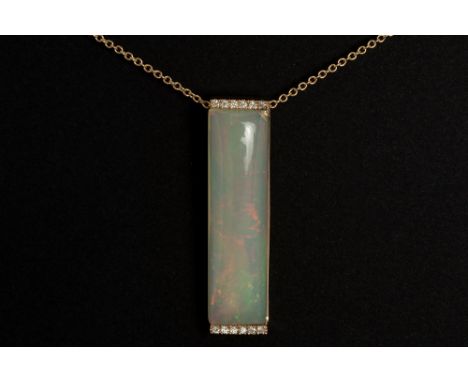 quite special fashionable necklace in pink gold (18 carat) with a beam-shaped pendant with a beautiful 12,56 carat opal and h