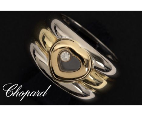 Chopard signed, marked and numbered "Happy Diamond" ring in yellow and white gold (18 carat) with a heart shape with a 'loose