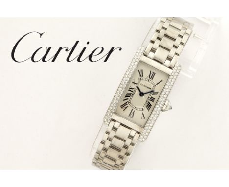 completely original quartz Cartier marked "Tank Américain" ladies' wristwatch in white gold (18 carat) with high quality bril