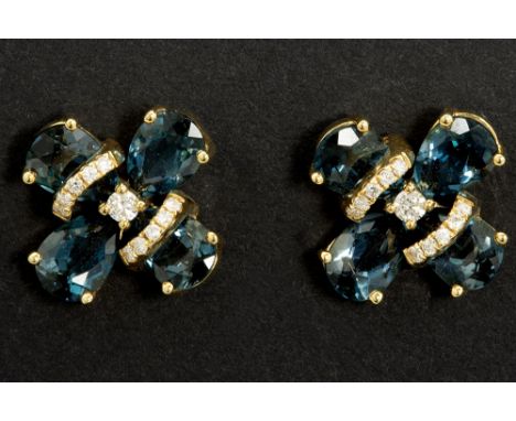 pair of  "four leaf clover" earrings in yellow gold (18 carat) with London blue topaz and high quality brilliant cut diamonds