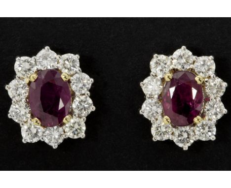 pair of earrings in white gold (18 carat) with ca 1,60 carat of Thai rubies and ca 1,60 carat of high quality brilliant cut d