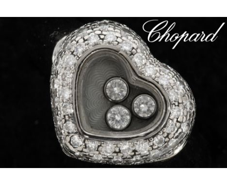 characteristic Chopard signed "Happy Diamonds" ring in white gold with ca 1,20 carat of very high quality brilliant cut diamo