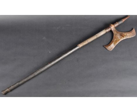 A 19th Century Indo Persian Islamic Ottoman Bulova or Tongi steel-bladed fighting or war axe from Chota Nagpur in India. Blac
