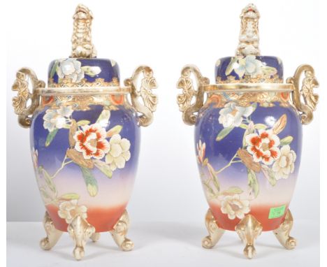 A pair of large decorative 20th Century Japanese satsuma vases / lidded censers. Figural Foo dog finial tops with hand painte
