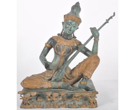 A 20th Century large bronze figurine of the Indian Hindi Deity Saraswati Goddess of wisdom, learning, eloquence and the patro