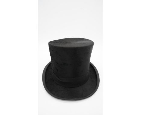 A vintage gent's moleskin top-hat retailed by City Cork Hat Company, boxed. H.17 W.23 D.31 