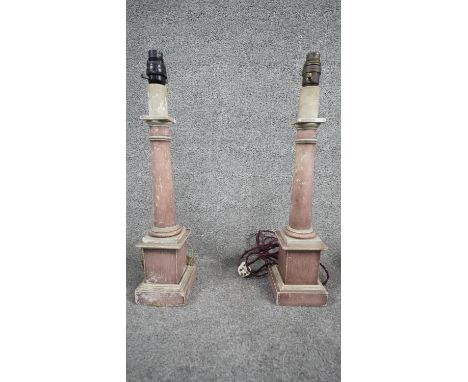 A pair of vintage painted wooden marble effect column table lights on rectangular ridged bases. With silk wrapped cord and sm