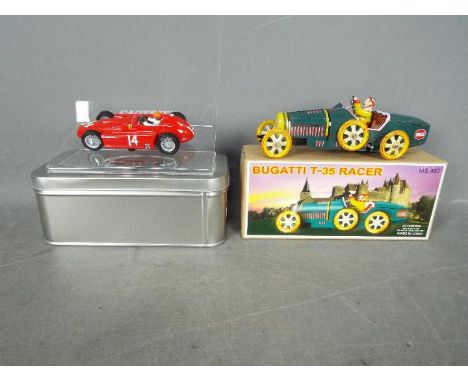 Cartrix - Schylling - 2 x cars, a 1956 Lancia - Ferrari D50 car number 14 as driven by Peter Collins. # 0965. The car appears