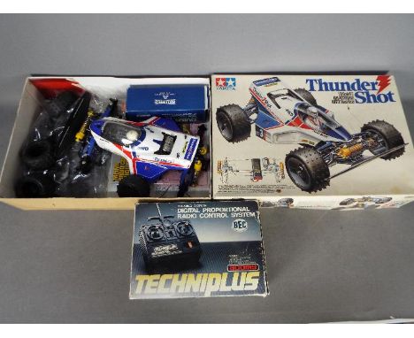 Tamiya - An assembled and boxed vintage Tamiya #58067 1:10 scale R/C 'Thunder Shot' High Performance 4WD Off Road Racer. The 