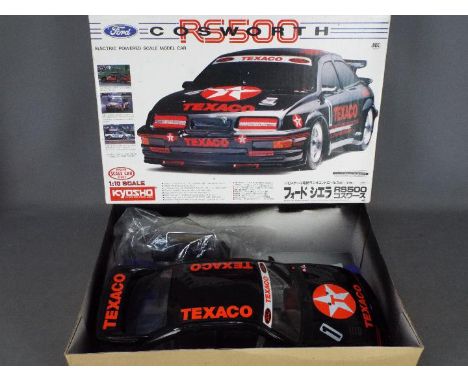 Kyosho - An assembled and boxed Kyosho #3178 1:10 scale R/C Ford Cosworth RS500 . The model shows signs of use, generally app