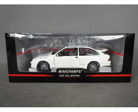 Minichamps - A boxed 1:18 scale diecast Ford Sierra RS 1988 by Minichamps. The model in white appears to be in Mint condition