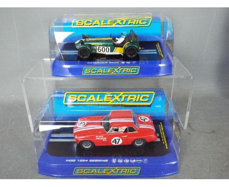 Scalextric - 2 x cars, a Caterham R600 from the Magnificent Sevens race series and a 1964 Sebring MGB roadster. # C3309, # C3
