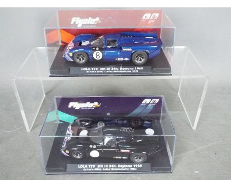 Flyslot - 2 x Lola T70 MkIII 1969 Daytona 24 hour cars. # 705102, # 705301. The black car is a special edition. Both models a