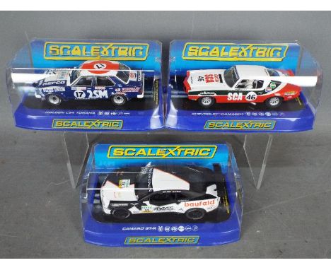 Scalextric - 3 x cars, a Holden L34 Torana, 2 x Chevrolet Camaro models. # C3304, # C3316, # C3391. The Holden is a Stirling 