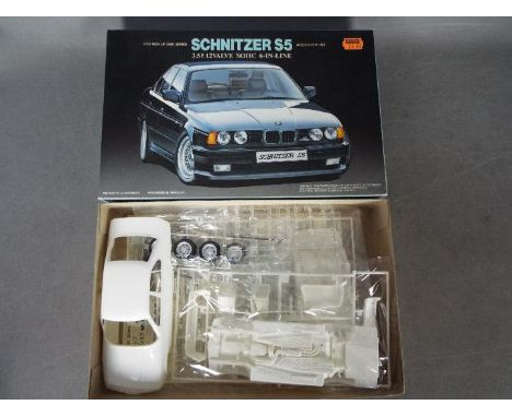 Fujimi - A boxed vintage 1989 Fujimi 1:24 scale #03212 'Inch Up Disc Series' BMW Schnitzer S5 plastic model kit. The kit appe