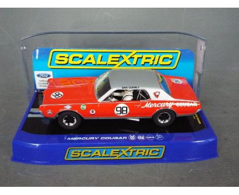 Scalextric - A 1967 Mercury Cougar Trans - Am number 98 car driven by Dan Gurney. # C3418. The car appears Mint in a Very Goo