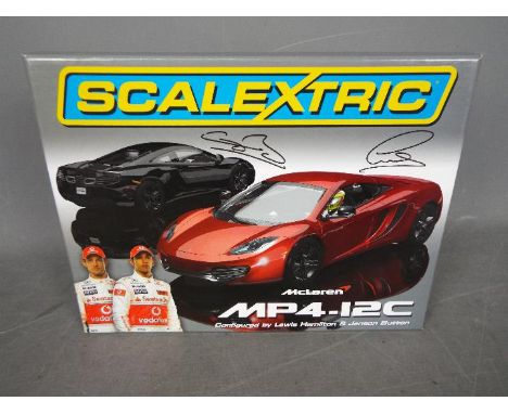 Scalextric - A limited edition McLaren MP4-12C set configured by Lewis Hamilton and Jenson  Button. # C3171A. This set is num
