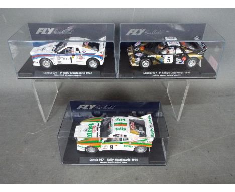 Flyslot - 3 x Lancia 037 models, 1983, Montecarlo Rally car in Martini livery, 1984 Montecarlo Rally car in totip livery and 