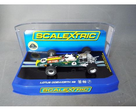 Scalextric - A 1968 Lotus Cosworth 49 as driven by Jim Clark at Kyalami. # C3206. The car appears Mint in a Very Good display