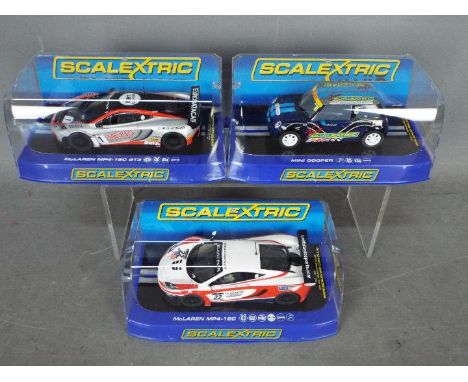 Scalextric - 3 x cars, a limited edition Mini Cooper and 2 x McLaren MP4-12C race cars. # C3428, # C3389, # C3382. The Team S