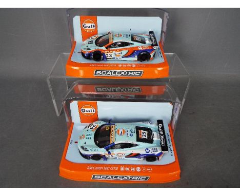 Scalextric - 2 x 2014 McLaren 12C GT3 cars from the Macau GT Cup series, car number 23 driven by Danny Watts and car number 2