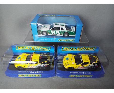 Scalextric - 3 x Chevrolet models, a Monte Carlo and 2 x Corvette C6R GT2 models, the number 3 and number 4 cars. # C3185, # 