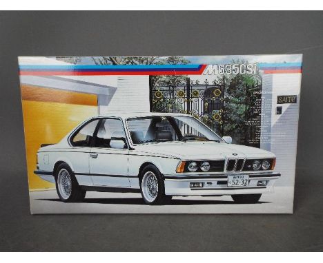 Fujimi - A boxed 1986 released Fujimi 1:24 scale #EM12 BMW 635CSi plastic model kit. The kit appears to be in a Near Mint Fac