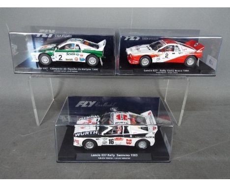 Flyslot - 3 x Lancia 037 models, 1983 Sanremo Rally car, 1984 Costa Brava Rally car, 1986 Campeon De Espana Rally car. # 8818