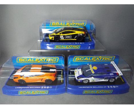 Scalextric - 3 x Lamborghini Gallardo models, the orange Valentino Balboni version, the blue MRP GTR model and the yellow GT-