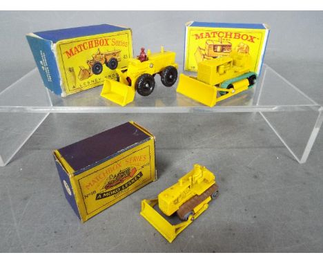 Matchbox, Lesney - Three boxed diecast model vehicles by Matchbox. Lot includes Matchbox #18 Caterpillar Bulldozer (B3 Moko L