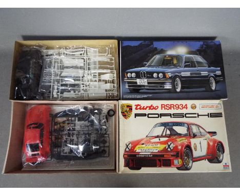 ESCI, Fujimi - Two boxed 1:24 scale plastic model car kits. Lot contains Fujimi #12052 Alpina C1-2.3 BMW 323i; with ESCI 3001