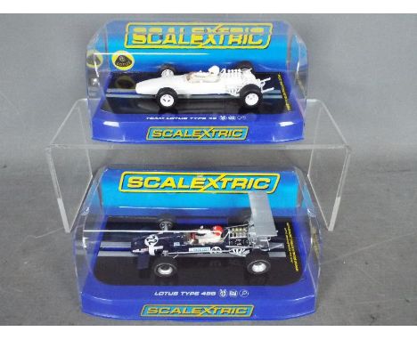 Scalextric - 2 x Lotus Type 49 slot cars, a Type 49 in plain white and a Type 49B Jo Siffert 1968 car. # 3442, # 3413. Both c