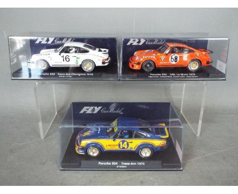 Flyslot - 3 x Porsche 934 racing models including two 1976 Trans-Am models and a 1978 Le Mans car in Jagermeister livery. # 8