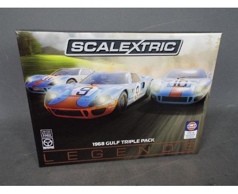Scalextric - A limited edition 3 x car Ford GT40 Gulf Legends set. # C3896A. This is set number 875 of only 2000 produced. Th