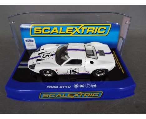 Scalextric - Ford GT40 1966 Le Mans car number 15 driven by Guy Ligier / Bob Grossman. # C3315. The car appears Mint in a Ver