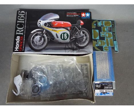 Tamiya - A boxed 2009 release Tamiya 1:12 scale 'Motorcycle Series Premium Model' Honda RC166 GP Racer plastic model kit. The