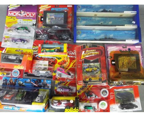 Hot Wheels, Solido, Johnny Lightning, Minic - A collection of boxed / carded diecast vehicles in various scales. Lot includes